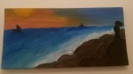 représentation d'un couché de soleil sur une cote roccheuse
