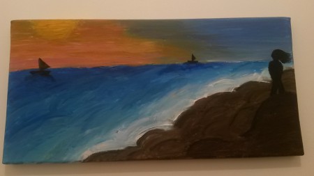 représentation d'un couché de soleil sur une cote roccheuse